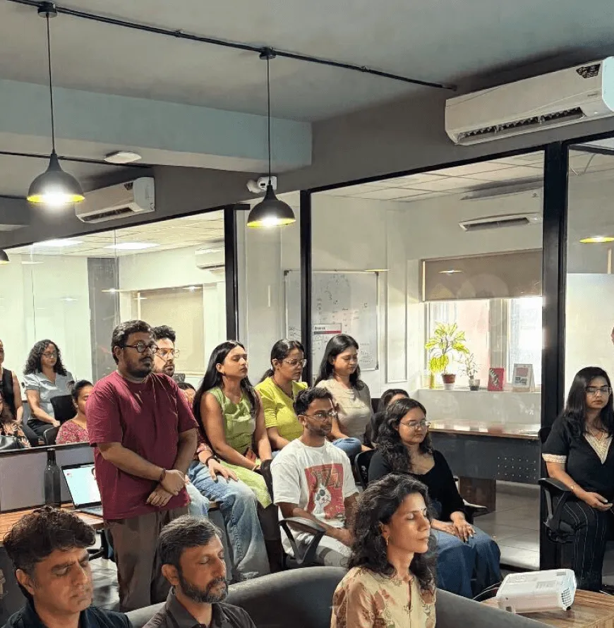 The Artium team gathered in the office for a wellness session