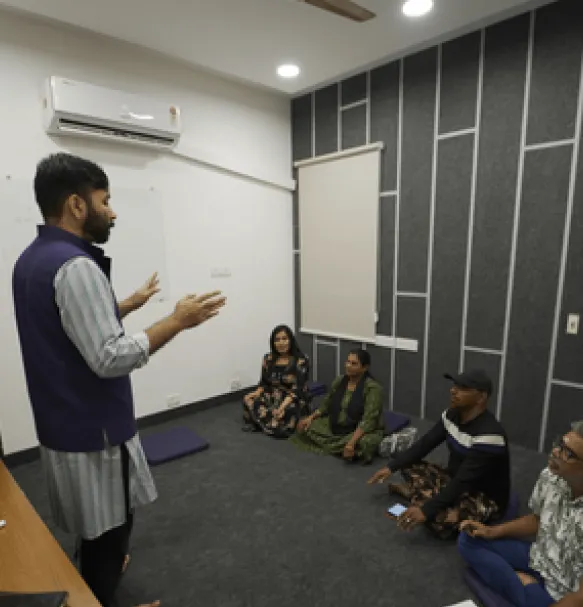 A teacher leading a group class at the Artium Experience Centre in Chennai