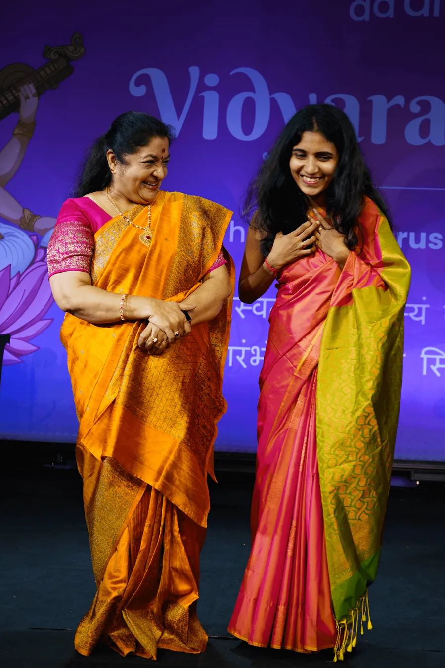 KS Chithra with a learner at a Vidyaarambham masterclass