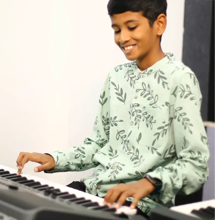 An Artium learner performing at a showcase