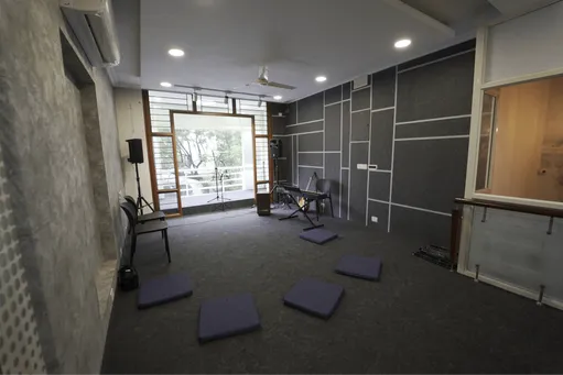 An Artium vocal studio with floor cushions and acoustic panels