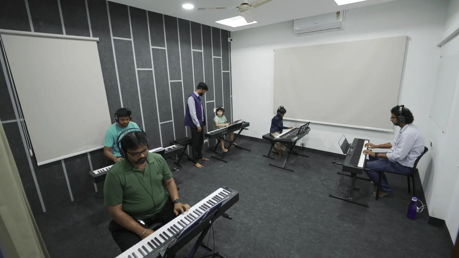Inside Artium Offline Centres: a keyboard class, a masterclass, a guitar ensemble and a learner on stage