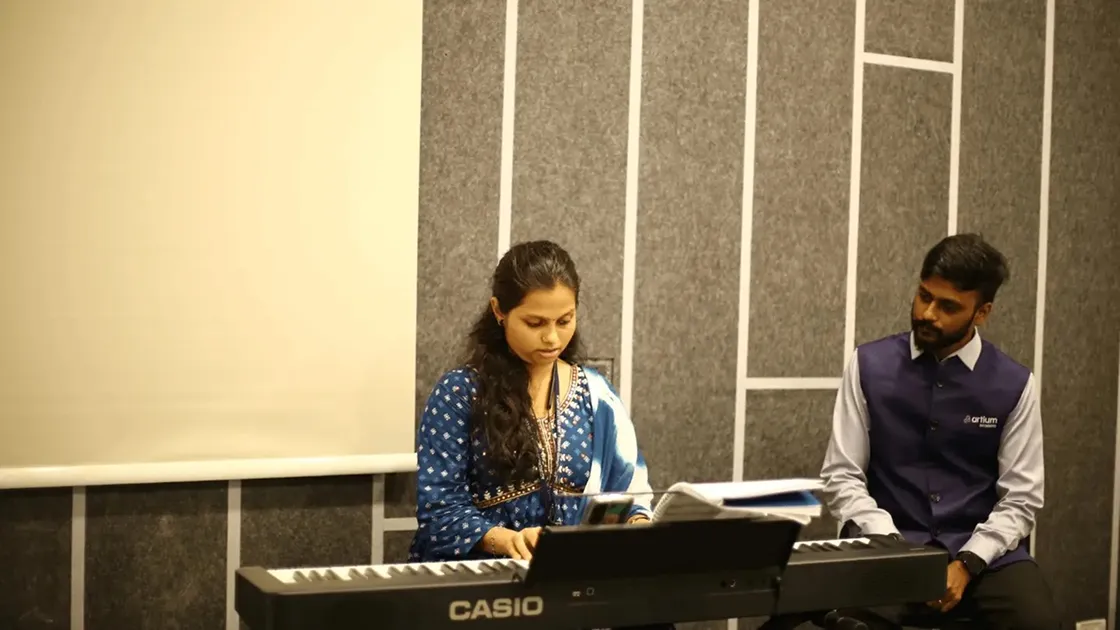 A learner practising on a keyboard in an Artium instrument room