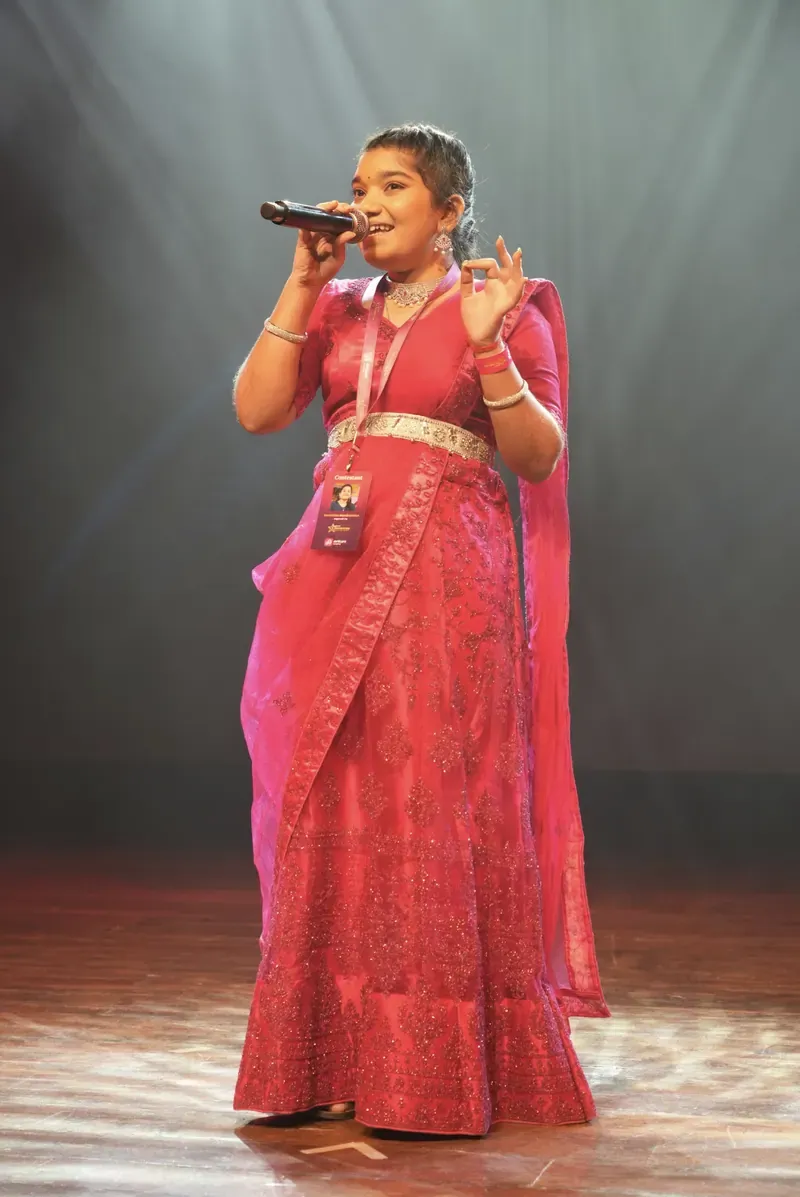 Ananya Iyer singing on stage