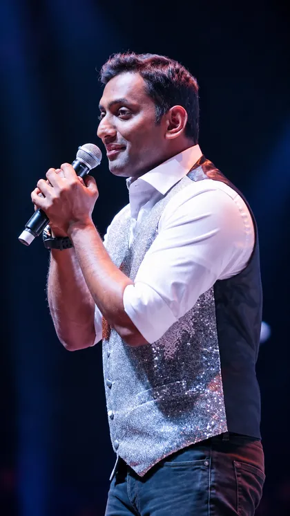 Sudeesh KM singing on stage