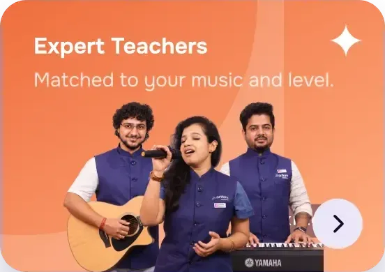 Three expert Artium music teachers with a guitar, a microphone and a keyboard