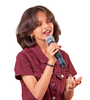 A girl singing into a handheld microphone