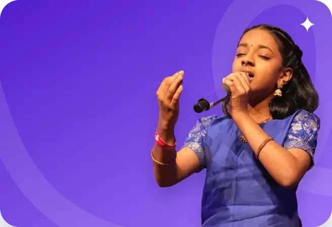A young singer performing on stage with a microphone
