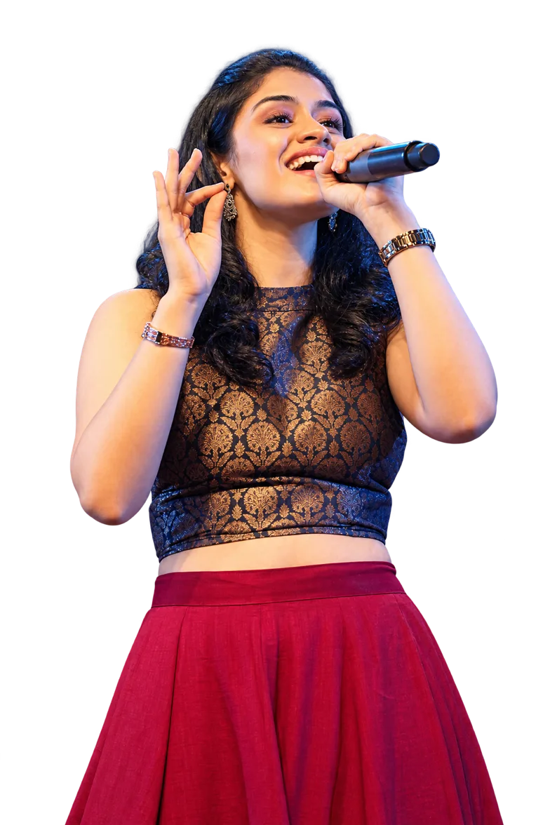 A young singer performing with a microphone
