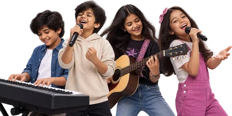 Four young learners singing and playing keyboard and guitar together
