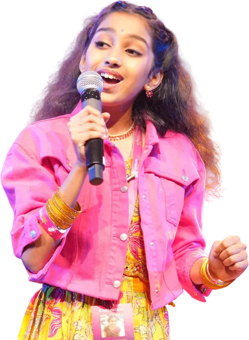 A young girl singing into a microphone