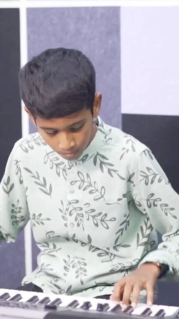 Maneesh Sai playing a classical piece on the piano at Artium Unmute, Chennai