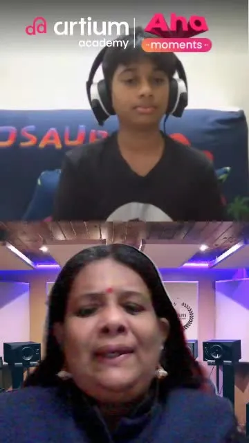 A young learner practising Carnatic vocals with his teacher in a live class