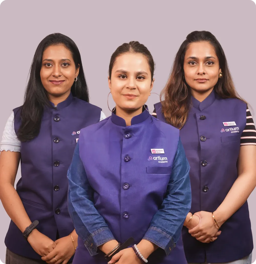 Three Artium teachers in their uniform
