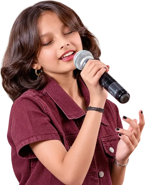 A learner singing into a microphone with her eyes closed