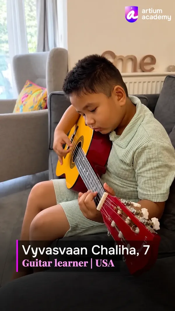 Vyvasvaan Chaliha, 7, playing the guitar at home